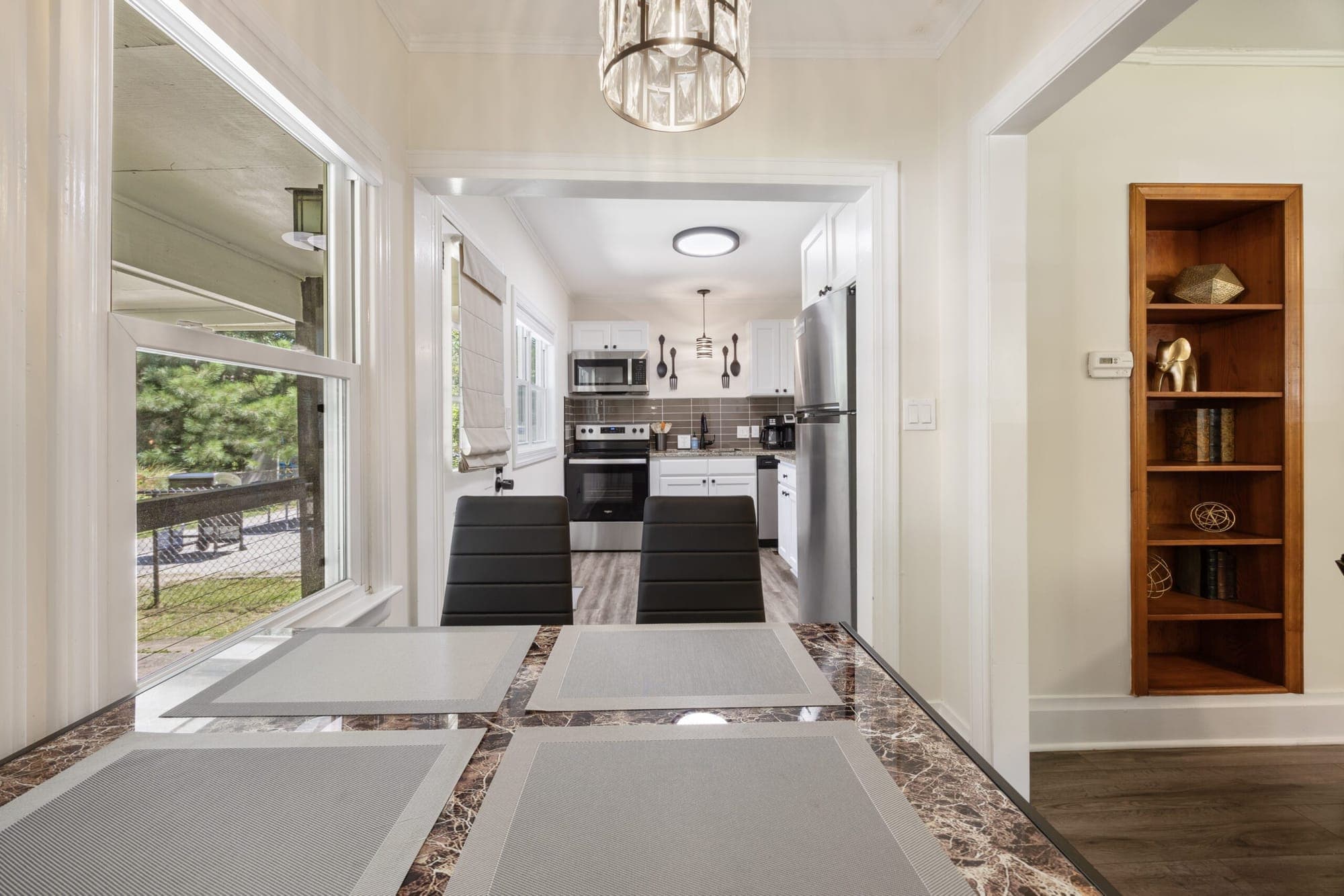 View through the dining area into the kitchen
