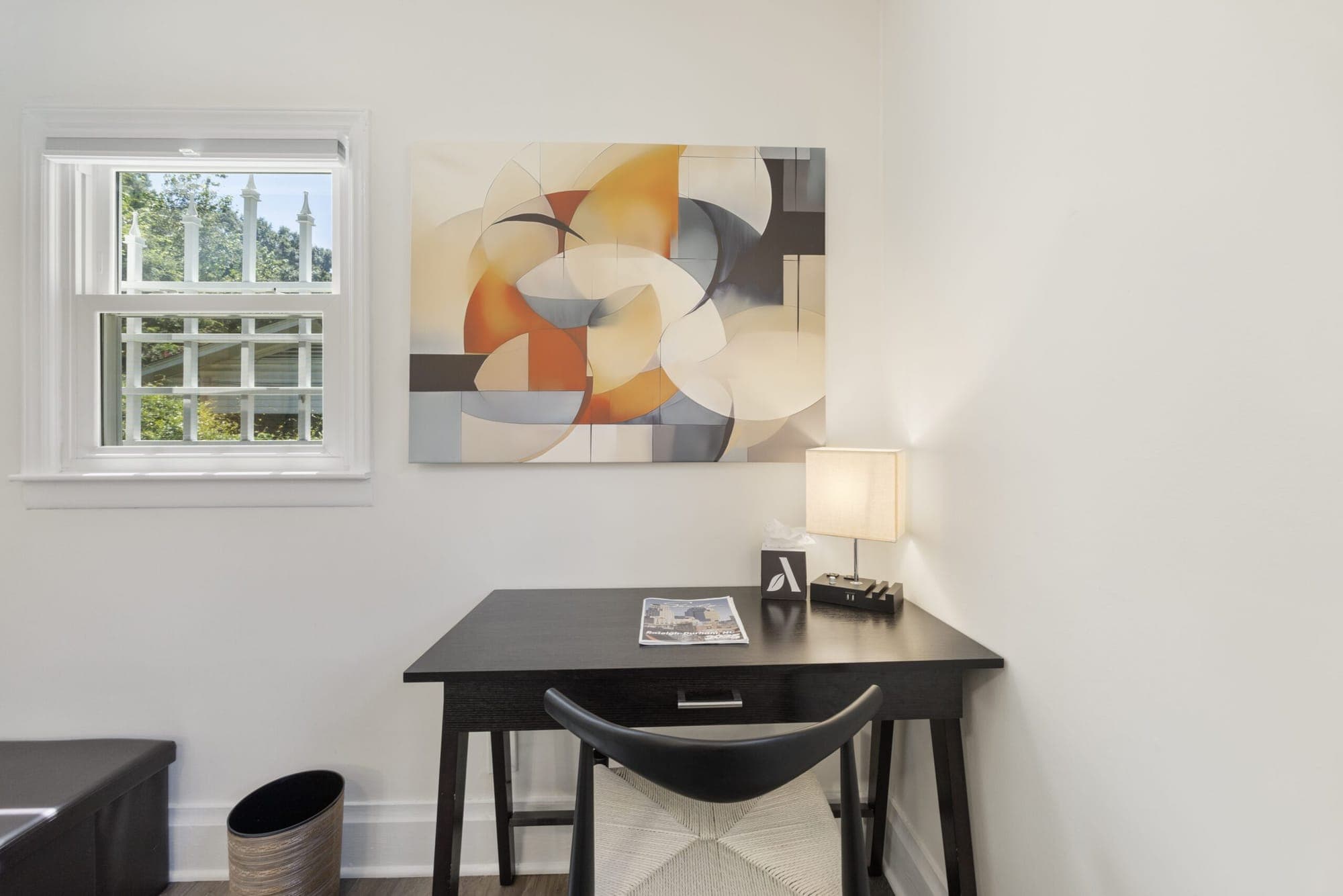 Desk and chair under a window