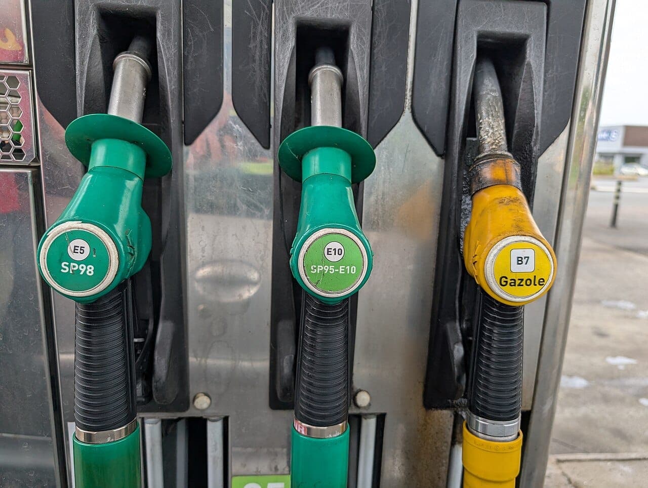 Fuel pump nozzles at a gas station