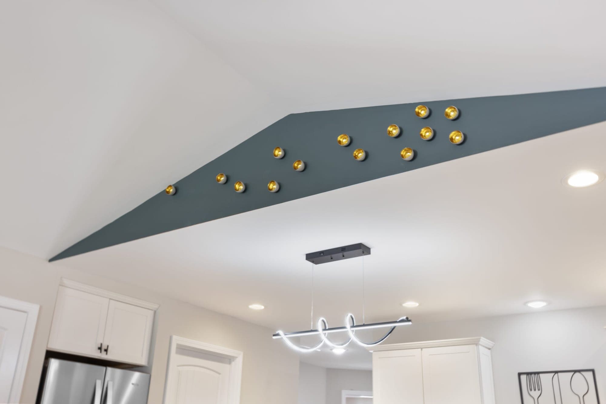 Accent ceiling above a modern pendant light