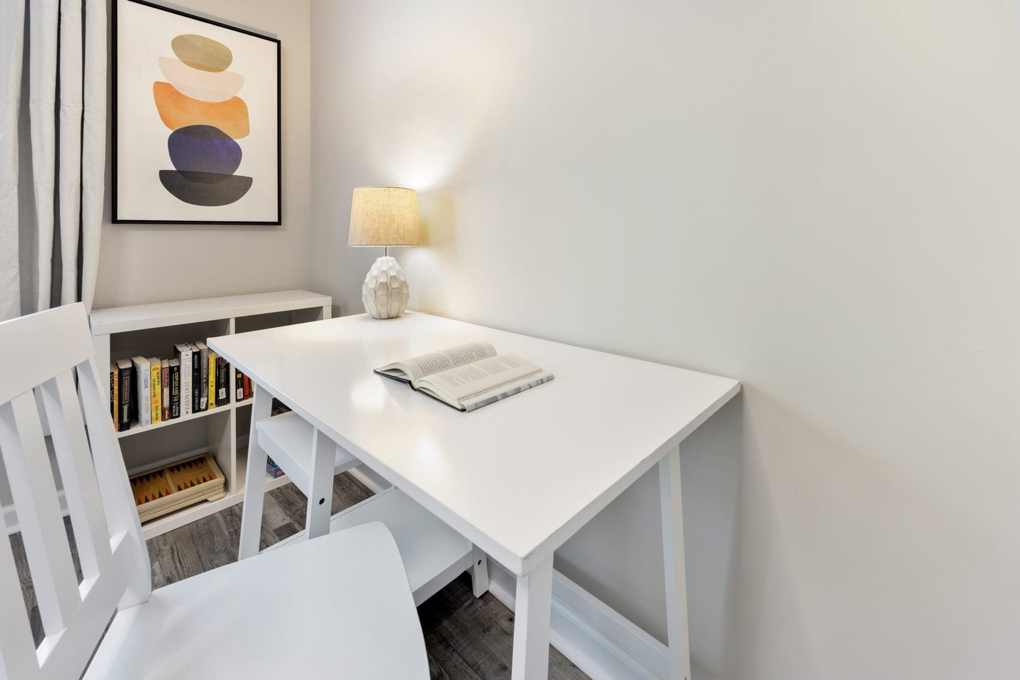 White desk and chair in the bunk room
