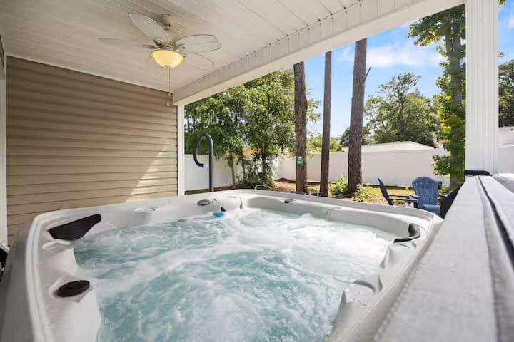 Hot tub on the covered back patio