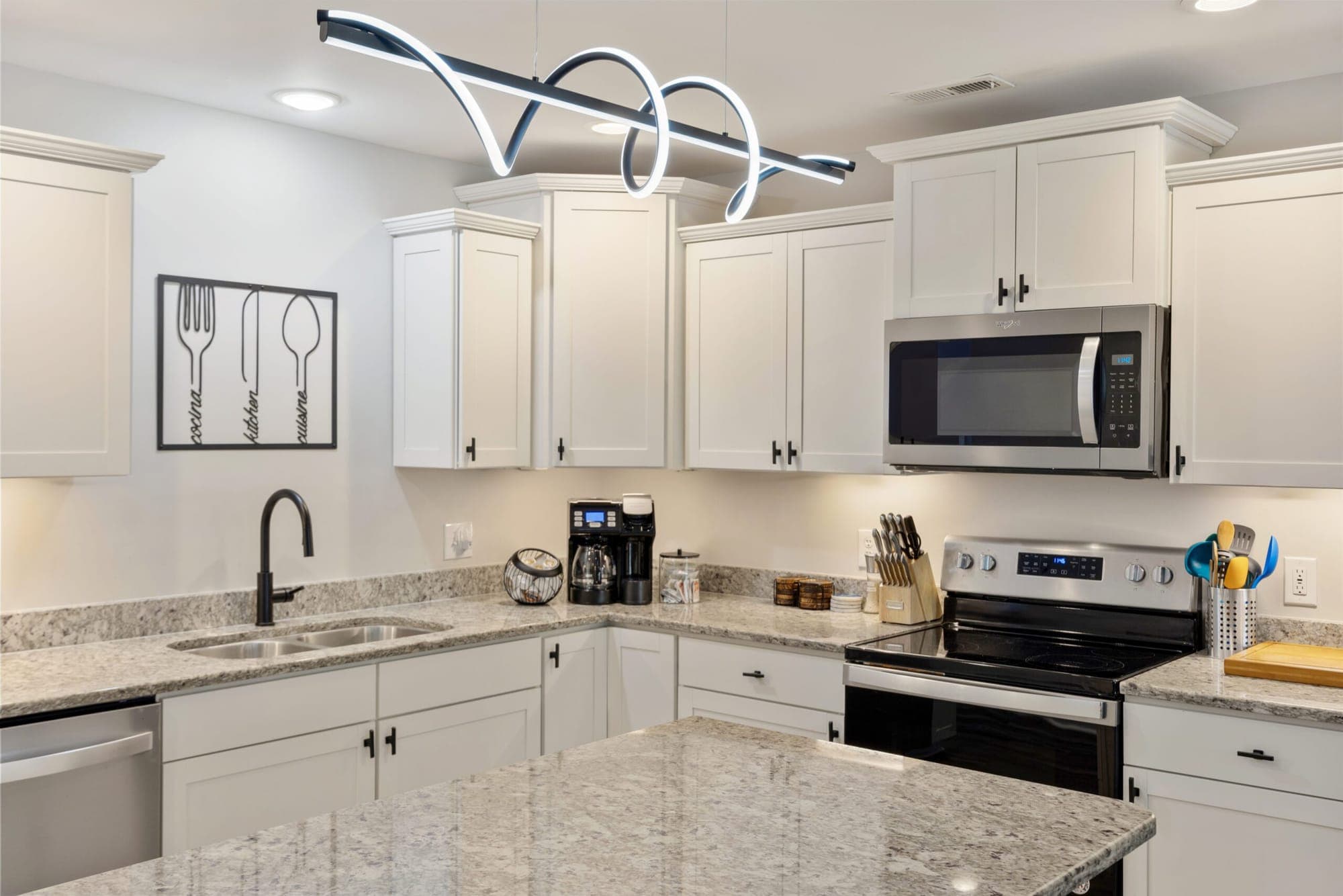Kitchen with microwave and range